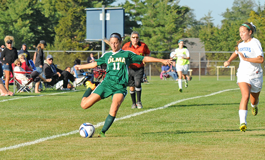 In high school girls’ soccer in Absecon, Holy Spirit defeated visiting Our Lady of Mercy Academy (Newfield) by a score of  2-1 on Oct. 7. At left, Our Lady of Mercy’s Dana DiSilva tries to move the ball downfield.

Photo by Alan M. Dumoff, more photos /ccdphotolibrary.smugmug.com