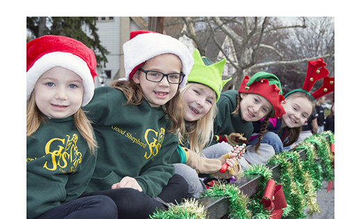 Good Shepherd Regional School students ride on a flatbed as they participate in the Collingswood Holiday Parade.