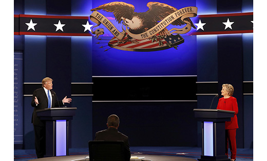 U.S. Republican presidential nominee Donald Trump speaks as Democratic presidential nominee Hillary Clinton listens during their first presidential debate Sept. 27 at Hofstra University in Hempstead, N.Y.

CNS photo/Mike Segar, Reuters