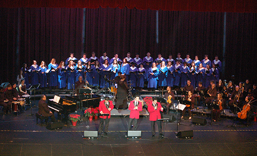 The Sicilian Tenors backed by student singers and musicians on the stage of Investors Bank Performing Arts Center in Sewell.

Photo by James A. McBride