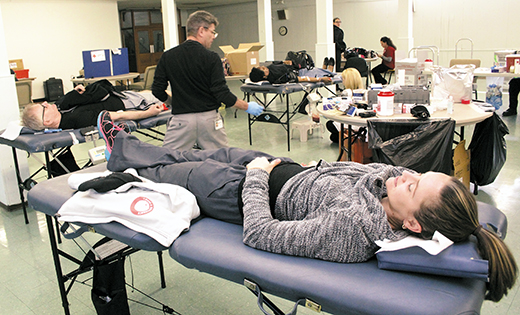 Julie Georgevic, a Glassboro resident who lives near Saint Bridget’s University Parish, took part in the Black Catholic Ministry’s annual Martin Luther King blood drive. The blood drive was also held in Cherry Hill and Camden on Jan. 16.

Photo by Mike Walsh