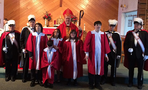 Bishop Dennis Sullivan marked World Day of the Sick, Feb. 11, by celebrating the sacrament of confirmation with the young people at the Saint John of God Community Services in Westville Grove. He administered the sacrament at nearby Holy Redeemer Church, Holy Angels Parish.