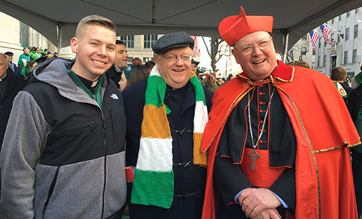 Bishop Dennis Sullivan and Camden seminarian Henry Laigaie pose for a photo with New York Cardinal Timothy M. Dolan during the Saint Patrick’s Day Parade March 17 in New York City.