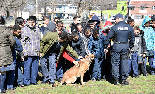 The Canine Division of the Camden County Police visited Saint Anthony of Padua School, Camden, and gave a demonstration on March 2. Above, students show their appreciation to one of the dogs.

Photo by James A. McBride