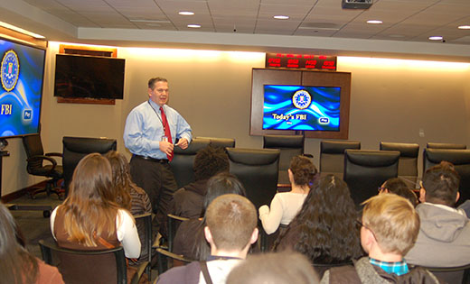 Michael Harpster, Special Agent in Charge of the FBI’s Philadelphia Division, speaks to youth of Saint Mary of Mount Carmel, Hammonton on Friday, March 24.  The students learned what it takes to be a special agent, or a member of the support staff, and toured the FBI headquarters.

Photo by Peter G. Sánchez