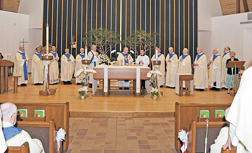 Bishop Dennis Sullivan and priests of the Camden Diocese celebrating 60, 50, 40 and 25 years of priestly ministry celebrate the annual Priest Jubilee Mass on May 11 at Saint Mary Parish in Cherry Hill. Below, their brother priests join in song.

Photos by Alan M. Dumoff