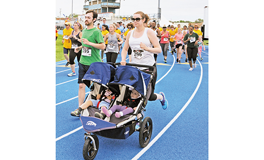Participants young and old take to the track at Williamstown High School during the sixth annual iRace4Vocations on Sunday, April 30.

Photo by Alan M. Dumoff