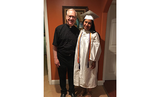 Father Vincent G. Guest and Cynthia Garcia