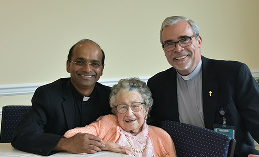 Photo by James A. McBride

The Diocesan Mass for Centenarians was celebrated last week at Saint Joachim Parish in Bellmawr. Above, Margaret DiOrio, 105 years of age, with Father Sanjai Devis and Deacon Jerry Jablonowski.