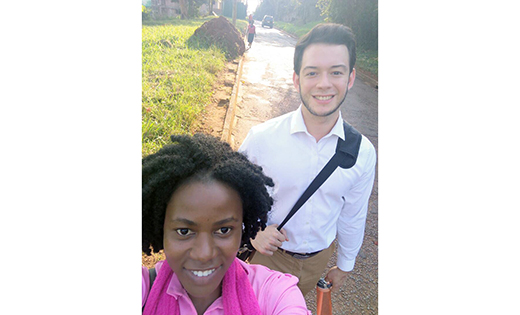 Luigi Nuñez, who grew up in North Camden and attended Camden Catholic High School in Cherry Hill, is using his computer skills while working at a non-profit in Uganda. He is pictured there with a co-worker, Pauline Namutebi.