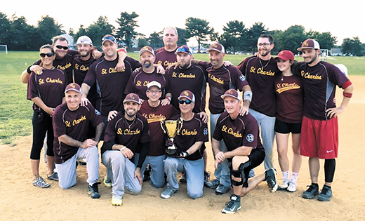 The Saint Charles Borromeo Parish, Sicklerville, softball team scored five runs in the last inning of their game against Our Lady of Hope, Blackwood, on Aug. 1 to capture the Camden Diocesan Co-Ed League championship and take home the Tom Walsh Memorial Trophy.