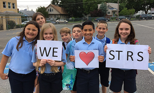 Students of Saint Teresa Regional School in Runnemede express their love of their school. Parents also expressed their happiness with Camden Diocesan elementary schools in a survey conducted by the Catholic Schools Office.