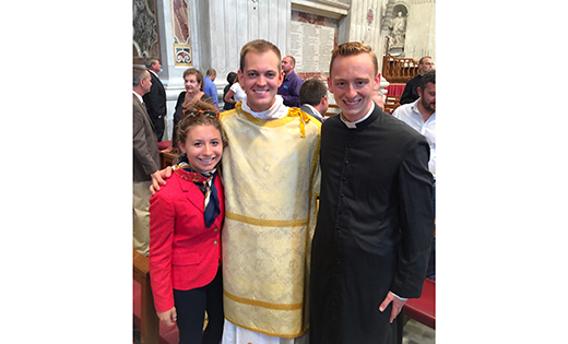 The author, Julianne Calzonetti, stands with Rev. Mr. Joshua Nevitt and Peter Gallagher, a seminarian of the Diocese of Camden.