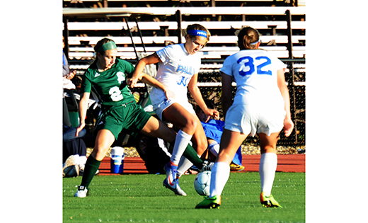 Camden Catholic's Shannon McHugh (2) and Paul VI's Jarah Barquero (30) fight for the ball during their Oct. 30 high school soccer contest in Haddon Heights. The home squad Eagles defeated the visiting Irish by a score of 2-1.

Photo by Alan M. Dumoff