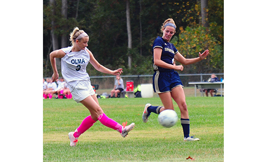 Our Lady of Mercy Academy blanked visiting Holy Spirit High School (Absecon), 3-0 on Oct. 23 in girls’ soccer in Newfield.  Above, Our Lady of Mercy Academy’s Abby Ward (3) attempts a shot past Holy Spirit’s Kat Patitucci.

Photo by Alan M. Dumoff