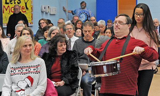 Jeffery Jones is the Little Drummer Boy at the Mass of the Christmas Vigil, celebrated in the Archbishop Damiano School gym. The school is part of Saint John of God Community Services, Westville, which  provides educational, therapeutic and vocational programs for people with disabilities, community childcare, inclusive preschool, and grant-funded job services for people with barriers to employment.

Photo by Alan M. Dumoff