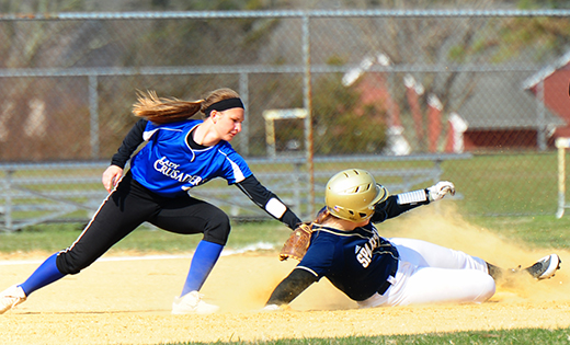 Photo by Alan M. Dumoff
— Holy Spirit High School’s Kamryn Englert is tagged out by Wildwood Catholic’s Nicole Kanya while trying to steal second base in an April 12 girls’ softball contest in Absecon. The visiting Crusaders defeated the hometown Spartans, 12-1.