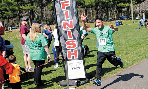Photo by Alan M. Dumoff

A jubilant Isaius Ramirez crosses the 5K finish line at the seventh annual iRace4Vocations, held April 22 in Washington Township’s Washington Lake Park. Catholics from throughout the six southern counties of New Jersey joined Bishop Dennis Sullivan, along with scores of priests, religious sisters and seminarians to both pray for and promote vocations to the priesthood and religious life.