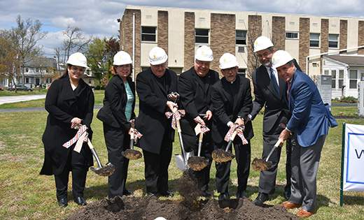 Photo by James A. McBride

Bishop Dennis Sullivan and others break ground for Saint Stephen – Phase II, a 68-unit senior affordable housing development located on the campus of Saint Stephen Parish, Pennsauken, on April 29. Pictured from left are Jennifer Galen, Legislative Aide to Sen. Cory Booker; Betsy McBride, Deputy Mayor Pennsauken Township; Bishop Sullivan; Father Walter Norris, member of the Diocesan Housing Services Board; Father Daniel A. Rocco, pastor, Saint Stephen Parish; James M. Reynolds, executive director, Diocesan Housing Services Corporation of the Diocese of Camden; and Joseph Del Duca, General Counsel, Walters Group.