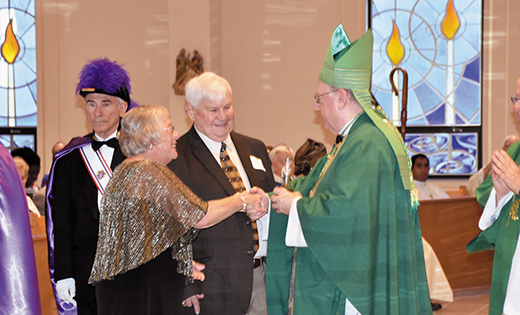 Margaret and Joseph Thomas, parishioners of Saint Mary Parish, Gloucester, celebrating 50 years of marriage, participate in the offertory with presentation of gifts to Bishop Dennis Sullivan at the Wedding Anniversary Mass June 10 at Mary, Mother of Mercy Parish, Glassboro. In attendance were couples married 25, 50, 60 and 70 years. See full list at:

Photo by James A. McBride