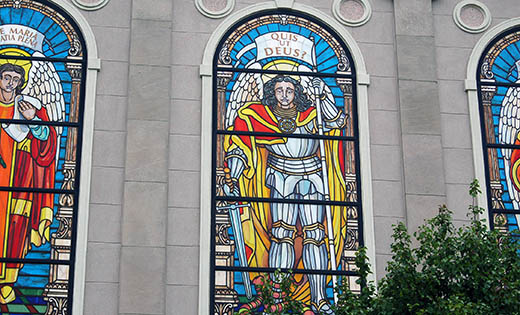Saint Michael wears armor and is armed with a sword in the stained glass at Saint Michael Church, Atlantic City, which will host the Deaf community on July 28.

Photo by Peter G. Sánchez