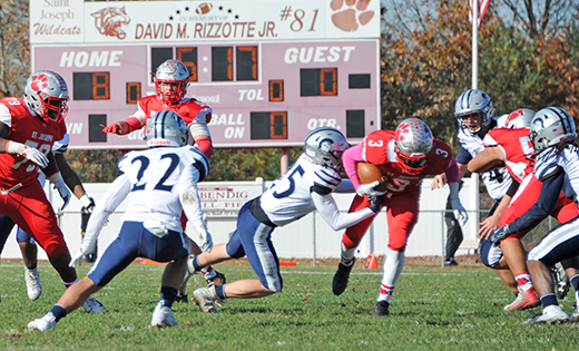 Photo by Alan M.  Dumoff

On Nov. 10, the Saint Joseph Wildcats football team advanced to the State of New Jersey’s Non-Public II Championship with a 52-0 blowout of Immaculata. On Dec. 1, the Hammonton team will play Holy Spirit in East Rutherford for the state title.  In this, the Wildcat running back Jada Byers (3) runs for one of his three touchdowns of the game.