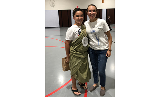 Kari Janisse with a youth group member dressed as Saint Jude.