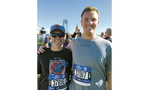 Seminarian Stephen Robbins (right) is pictured with Father Michael Romano, director of Vocations for the Diocese of Camden, in New York where the two ran the TCS New York City Marathon last month. The world’s largest marathon, it courses through the five boroughs of the city. Below photo: The Queensboro (59th Street) Bridge into Manhattan is one of the most arduous parts of the 26-mile race.
