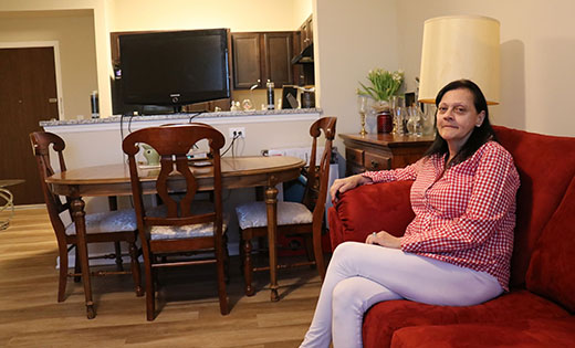 Kimberly Van Hook is one of eight senior citizen residents who, after experiencing difficulty finding permanent housing, recently found a place to call home at Stonegate at Saint Stephen – Phase II.