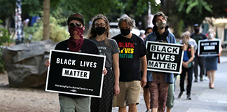 People in Portland walk near the Justice Center to support of Black Lives Matter Sept. 1, 2020. (CNS photo/Caitlin Ochs, Reuters)