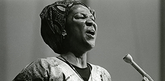The late Sister Thea Bowman, a Franciscan Sister of Perpetual Adoration from Canton, Miss., was nationally known for her work to advance the life of her fellow black Catholics in the church. She was 52 when she died of bone cancer on march 30, 1990, but her legacy as an educator, evangelist and gospel singer lives on. She is pictured in an undated photo. (CNS photo/Michael Hoyt) (March 30, 2010) See BOWMAN-HOLYWEEK March 30, 2010.