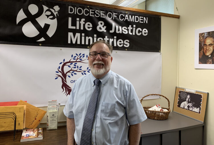 Photo by Peter G. Sánchez
Dr. Michael Sims, seen in his Camden office, is the director of Life and Justice Ministries for the Diocese. He’s been busy visiting parishes and identifying needs since starting the job in March.
