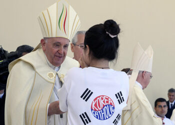 Pope Francis greets young people from South Korea after announcing that the next World Youth Day will take place in 2027 in Seoul. The pope made the announcement after the closing Mass for World Youth Day at Tejo Park in Lisbon, Portugal, Aug. 6, 2023. (CNS photo/Vatican Media)