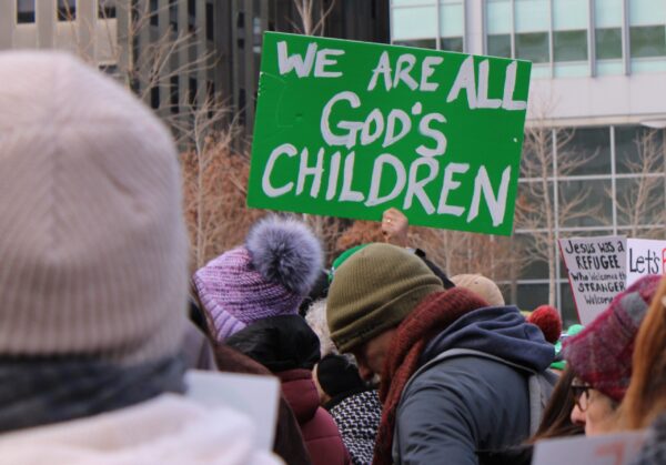 A participant holds a sign during a Jan. 25, 2025, interfaith rally in support of immigrants at Love Park in downtown Philadelphia. The event, organized by nonprofit New Sanctuary Movement, challenged city officials to push back on Trump administration policies that restrict immigration and include plans for mass deportations of unauthorized immigrants. (OSV News photo/Gina Christian)