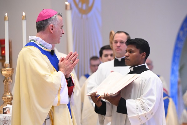 Seminarian Theodore Deluhery participates in Ordination Mass, May 17, in Our Lady of Lourdes Church, Glassboro. (Photo - Joe Warner)