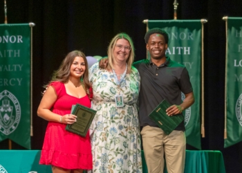 Courtesy photo
Uchenna Ekeabu, right, poses for a photo with classmate Lauren DeLano, left, and faculty member Noemi Merenyi, after the students accepted awards during the Camden Catholic High School Senior Awards night.