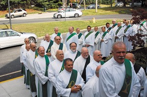 Photo by James A. McBride Deacons of the Diocese of Camden wait to enter St. Charles Borromeo Church, Sicklerville, for the closing liturgy of the permanent deacon convocation on Sept. 20. Deacons and 18 men in formation gathered for prayer, fellowship and continuing education. 