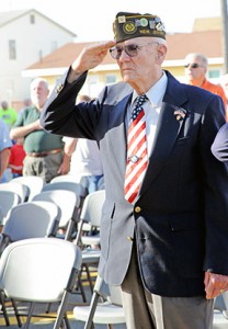 Robert McCormack, a member of North Wildwood’s VFW 5941, salutes the American flag during the 9/11 remembrance held Sept. 11 at the North Wildwood firehouse. Cape Trinity Catholic School and Wildwood Catholic High School joined in the ceremony, which included students singing “Proud to Be an American,” and Father Joseph Wallace, president of Wildwood Catholic, giving the invocation. Photo by Alan M. Dumoff, ccdphotolibrary.smugmug.com 