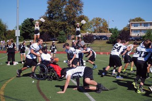 On Sept. 27, Bishop Eustace Preparatory School in Pennsauken held Victory Day for special needs students, as football players, Pep Band members and cheerleaders rooted them on during their activity drill on the school’s football field. Above, Madelyn DeLuca is a cheerleader for the day, with Gina D’Antonio, Gabrielle Sheehan and Elisabeth Reilly. Photos by Maria D’Antonio 
