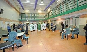 Bishop Dennis Sullivan and clergy pray with inmates at the Salem County Correctional Facility in Woodstown on Nov. 5. 