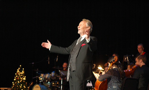 Phil Coulter, who has become known as Ireland’s Musical Ambassador during a 50-year musical career, sings during Celtic Twilight Christmas Dec. 6 at the TD Bank Arts Centre. Below, children from local Catholic schools sing during the program.

Photos by James A. McBride