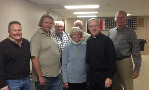 Father Vincent Guest, pastor of the Parish of the Holy Cross in Bridgeton, is pictured with parish staff and Code Blue volunteers. Code Blue, which the parish was a part of, is a local outreach to the homeless.