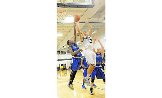 In high school boys’ basketball, St. Augustine (Richland) defeated visiting Wildwood Catholic, 81-64, on Jan. 13. Above, St. Augustine’s Max Lamcken powers over defenders for 2 points.

Photo by Alan M. Dumoff,http://ccdphotolibrary.smugmug.com
