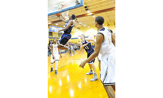 The visiting St. Augustine Preparatory School boys’ basketball team beat the home squad of Holy Spirit, 55-52, in Absecon on Jan. 24. Above, a Hermits player goes up for two.

Photo by Alan M. Dumoff, more photos http://ccdphotolibrary.smugmug.com