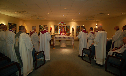 Bishop Dennis Sullivan celebrates Mass at Sacred Heart Residence for Priests, Cherry Hill, on Dec. 16. Some 20 retired priests of the Camden Diocese live there.

Photo by James A. McBride