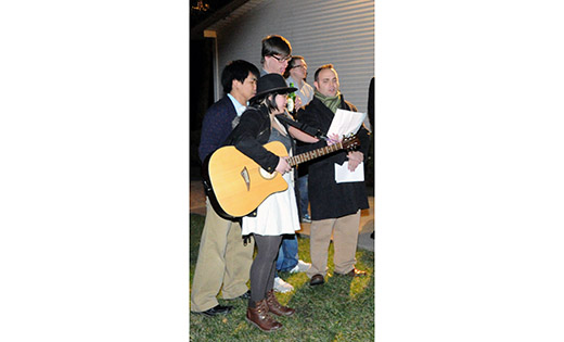 Young adults lead a Christmas Carol sing-a-long on Dec. 27, during a Christmas party at Villa Pieta in Linwood. The festive evening brought together groups from the parishes of Our Lady of Sorrows, Linwood, and St. Gianna Beretta Molla, Northfield.

Photo by Alan M. Dumoff