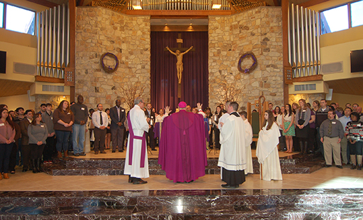 With the catechumens in front of him, Bishop Dennis Sullivan leads the Rite of Election Feb. 22 at Our Lady of Hope Parish, St. Agnes Church, Blackwood. The 165 individuals, ready to enter into full communion with the Catholic Church at the Easter Vigil, came from 39 parishes in the Diocese of Camden.

Photo by James A. McBride