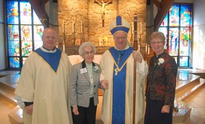 On Feb. 7 Bishop Dennis Sullivan celebrated the World Day for Consecrated Life and Jubilee Celebrations at Holy Family Parish in Sewell, honoring the religious sisters serving in the Camden Diocese who are celebrating jubilees. Above, Bishop Sullivan and Father Robert Hughes, Vicar General, with Sister Elizabeth Mercer, SSJ, celebrating 70 years, and Sister Dorothy Urban, SSJ (50 years).