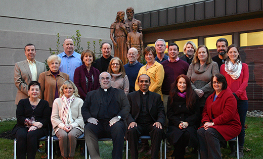 The newly commissioned Stephen Ministers of Holy Family Parish, Sewell, pose for a photo with Father John P. Picinic, pastor; Father Sanjai Devis, parochial vicar, and Stephen leaders. Holy Family has trained 56 Stephen Ministers who provide support and care to members of the parish and surrounding community.