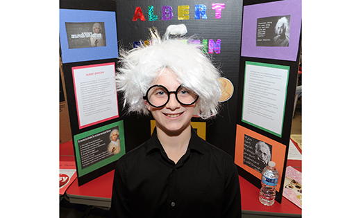 St. Michael the Archangel Regional School in Clayton presented “A Night At The Wax Museum” on Jan. 28, with students in grades 5-8 dressing as historic “wax” figures and providing visitors with information about their characters and achievements. Above, Albert Einstein (fifth grader Vincent Masci) wigs out in the name of science, while Blessed Mother Teresa (sixth grader Faith Rosa) tells her story.

Photo by Alan M. Dumoff, http://ccdphotolibrary.smugmug.com
